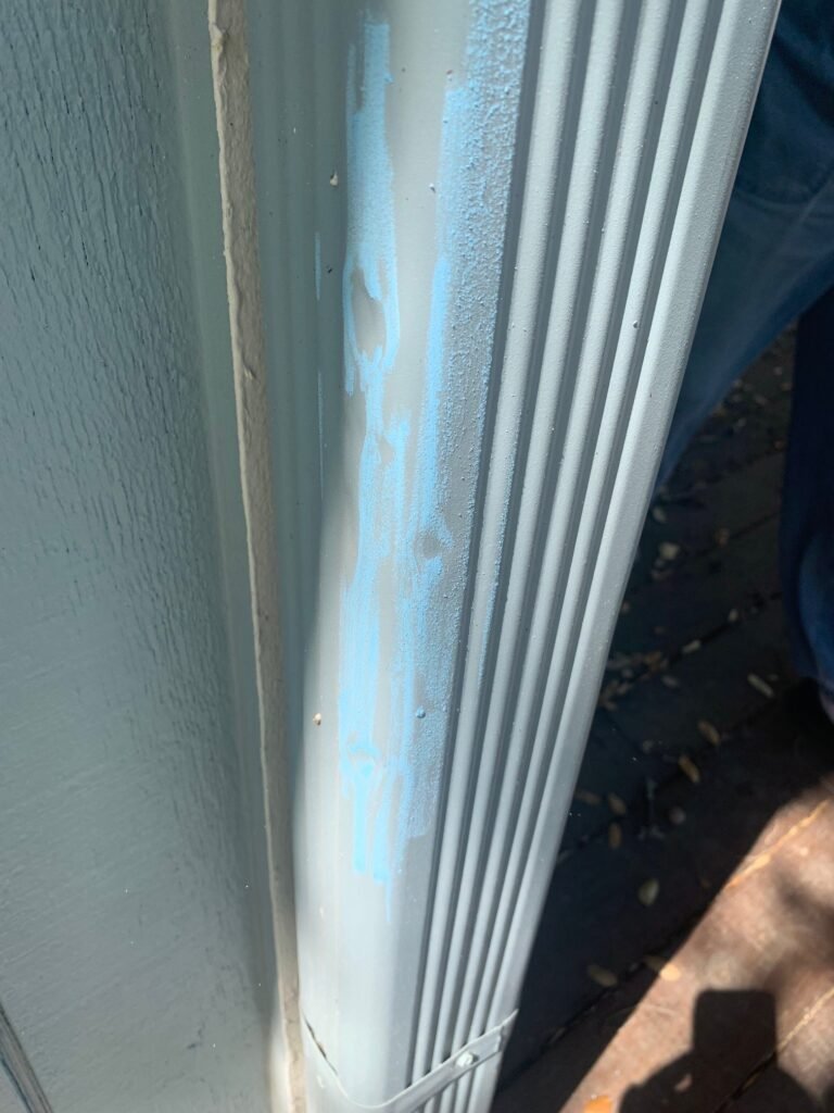 hail damage downspout leander tx